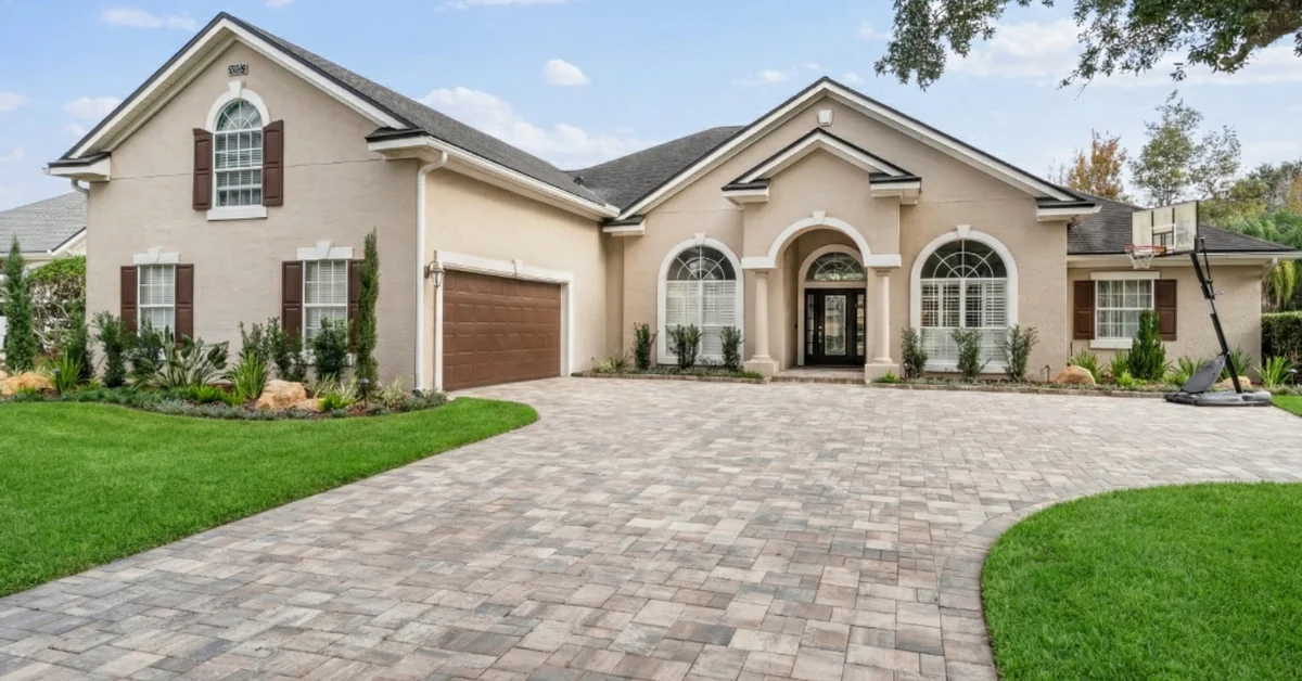 Running bond paver driveway installation in gray tones by Jax Pavers in Jacksonville FL